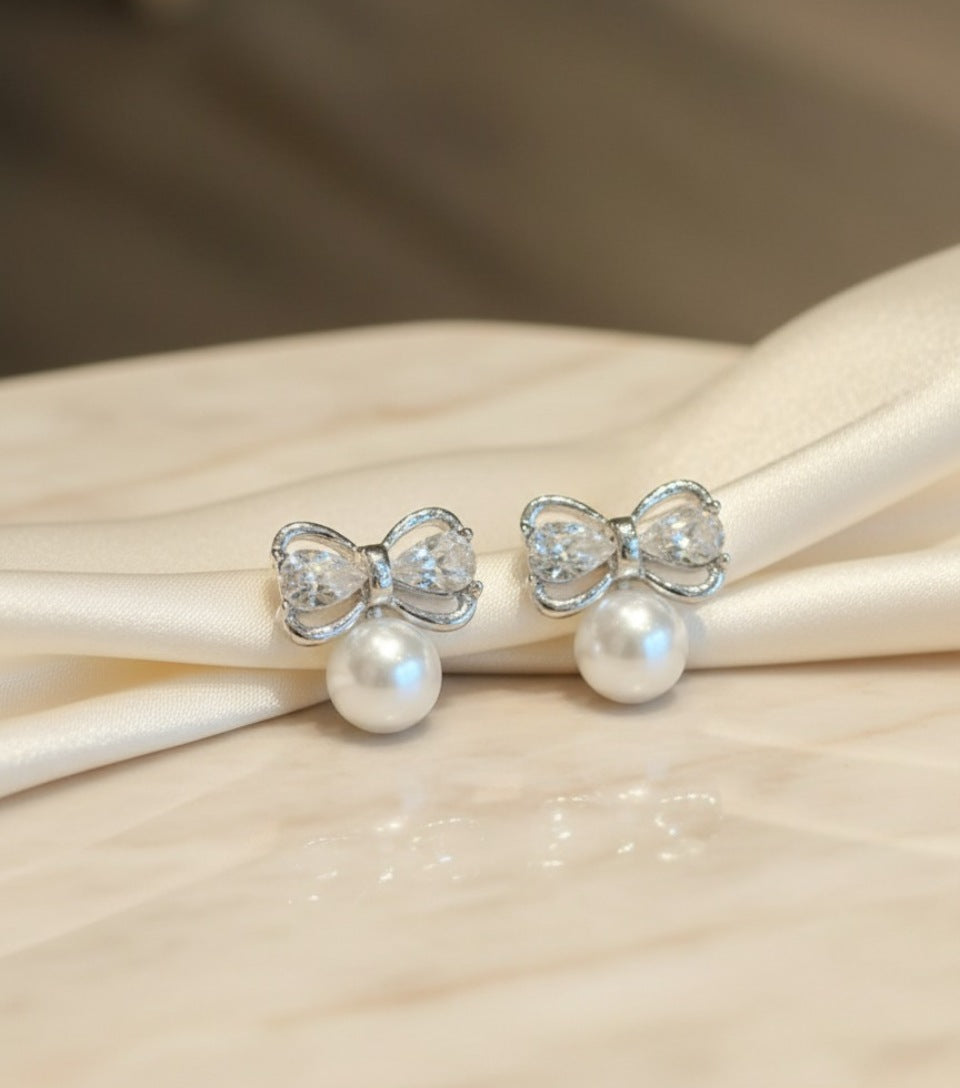 Elegant Crystal Bow Pearl Stud Earrings